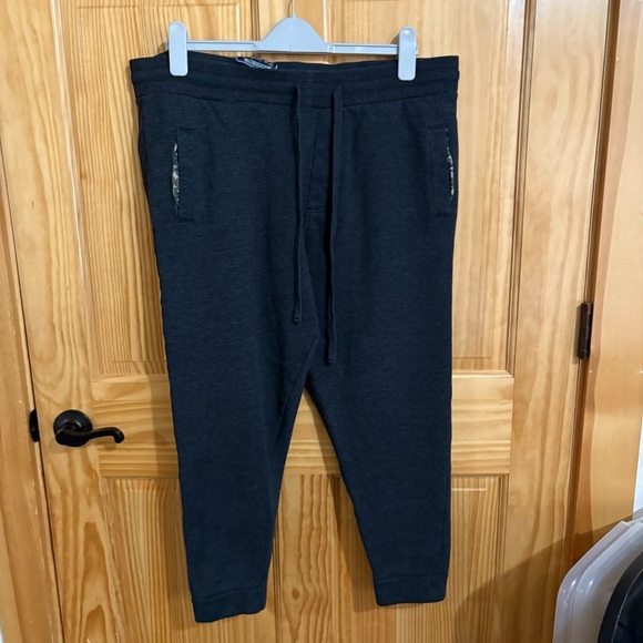 BURLEBO Gray Fleece Joggers with Camo Lined Pockets - Picture 1 of 8